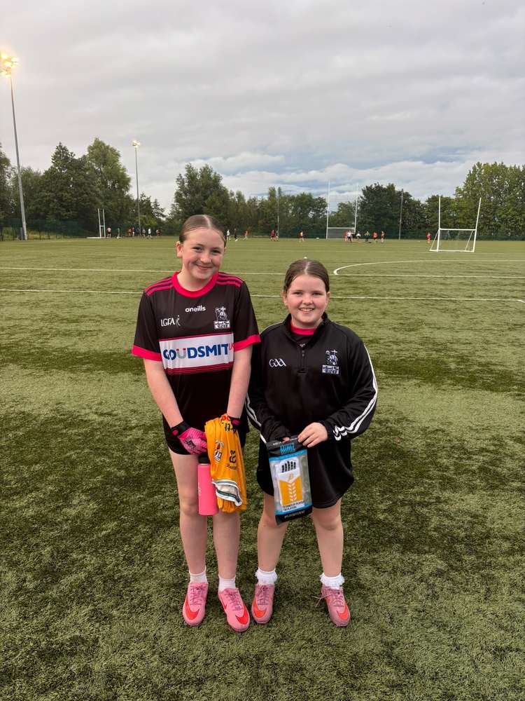 Daisy and Eva with the Antrim gear they received for their performances