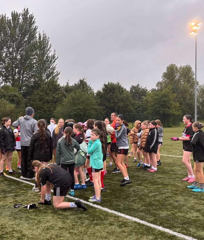 Players gathered for instruction during the training session