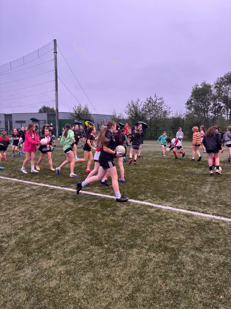 Girls taking part in football drills