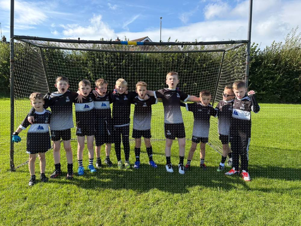 St Agnes U8 boys standing together in front of the goal after their Go Games